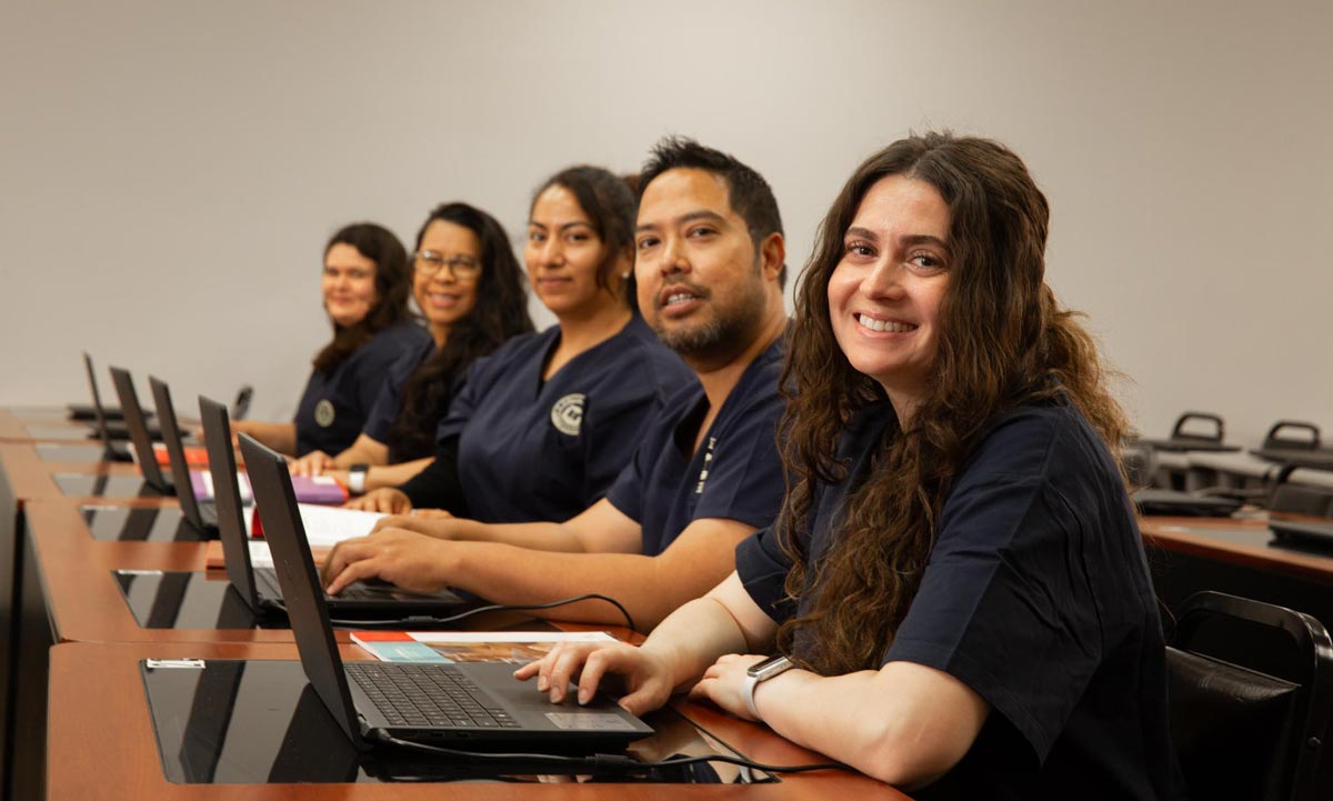 MAprogram Students engaged in classroom learning at California Career Institute, receiving hands-on vocational training.